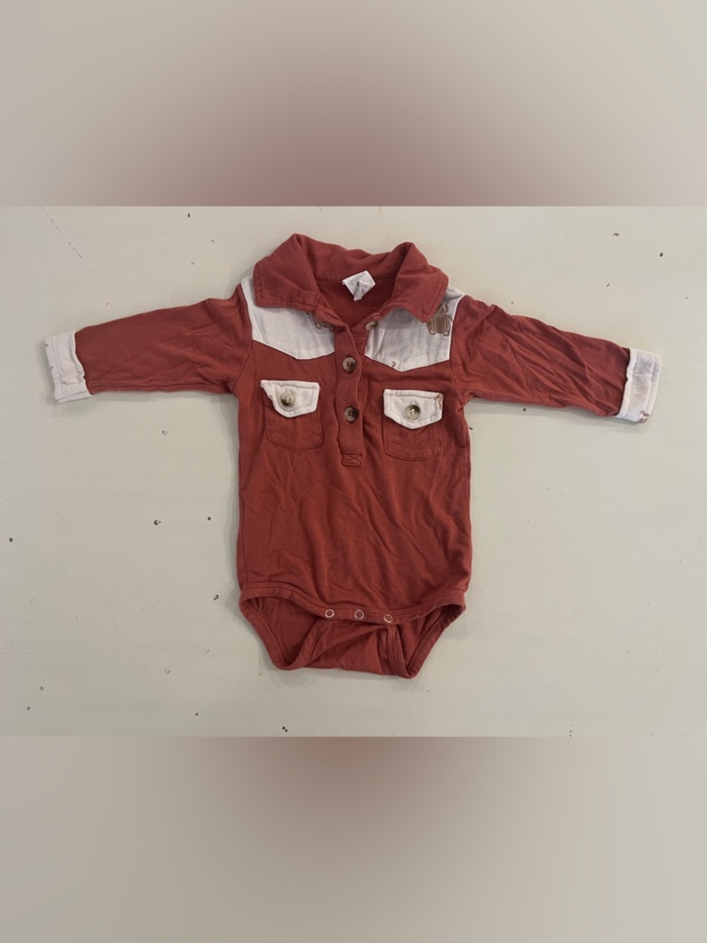 Kate Quinn cowboy bodysuit
